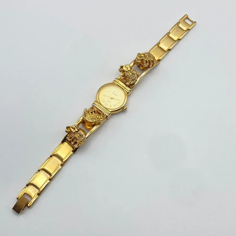 Cassant Womens Watch 22mm Gold Tone Elephant Slide Charms New Battery 6.75